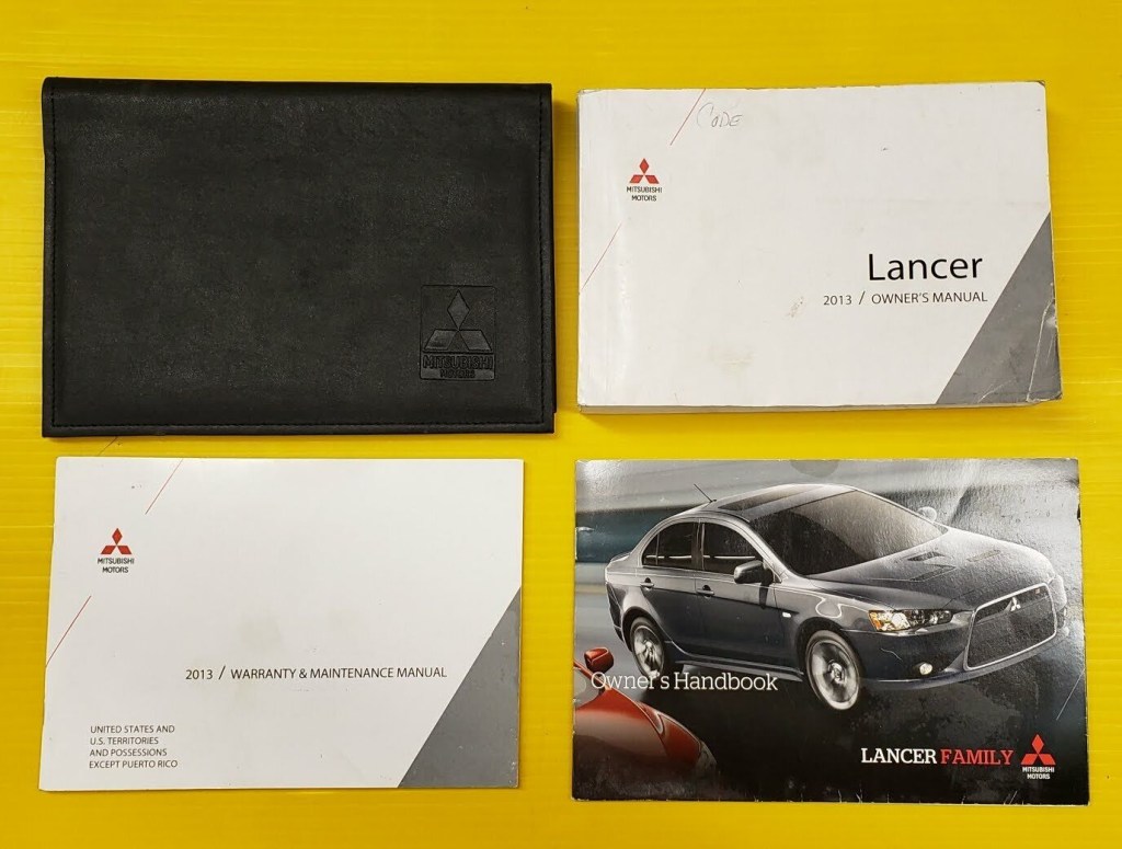 Picture of: Mitsubishi Lancer Owners Owner’s Manual Set w/ Case OEM